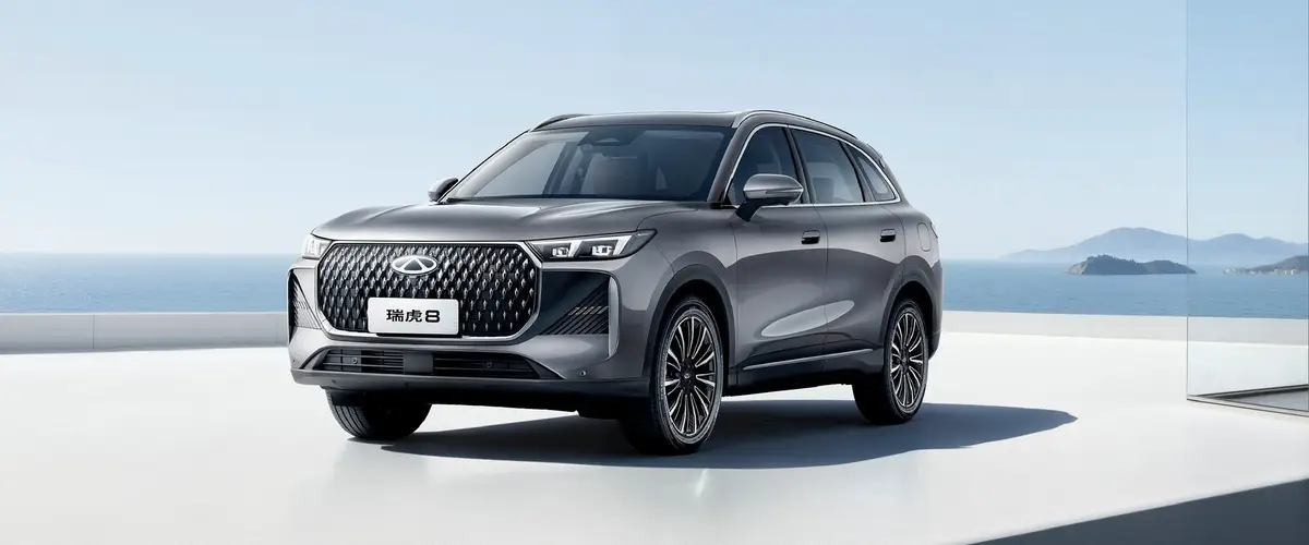 Chery Tiggo 8 (Чери Тигго 8) из Китая под заказ — пятого поколения, серый, вид спереди в три четверти