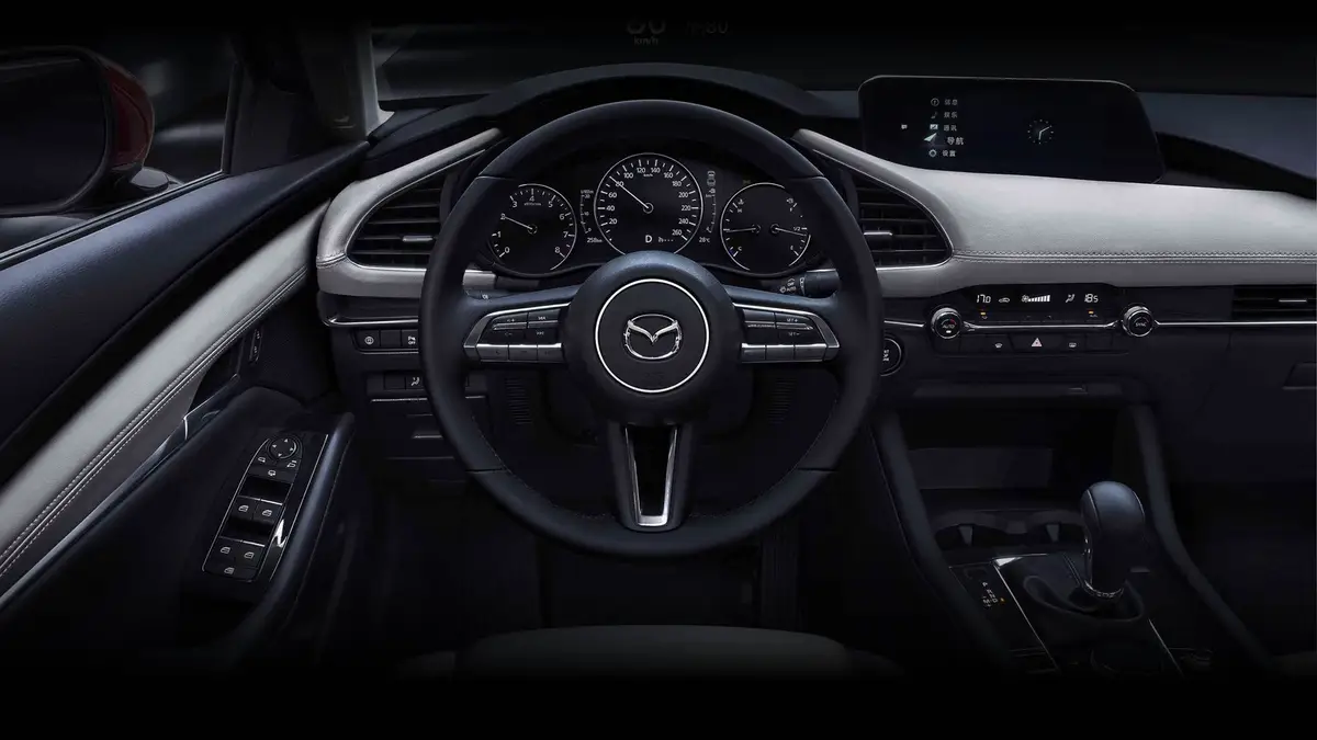 Mazda 3 (Мазда 3) из Китая под заказ — Салон Axela, руль и панель приборов